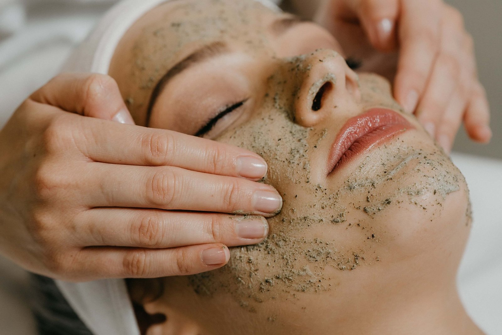 Close-up of a calm skincare consultation moment, representing an unhurried first conversation